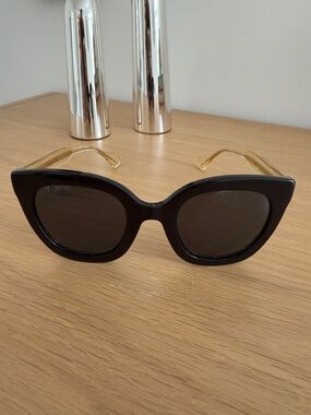 Gucci Black Cat-Eye Sunglasses with Gold Temples
